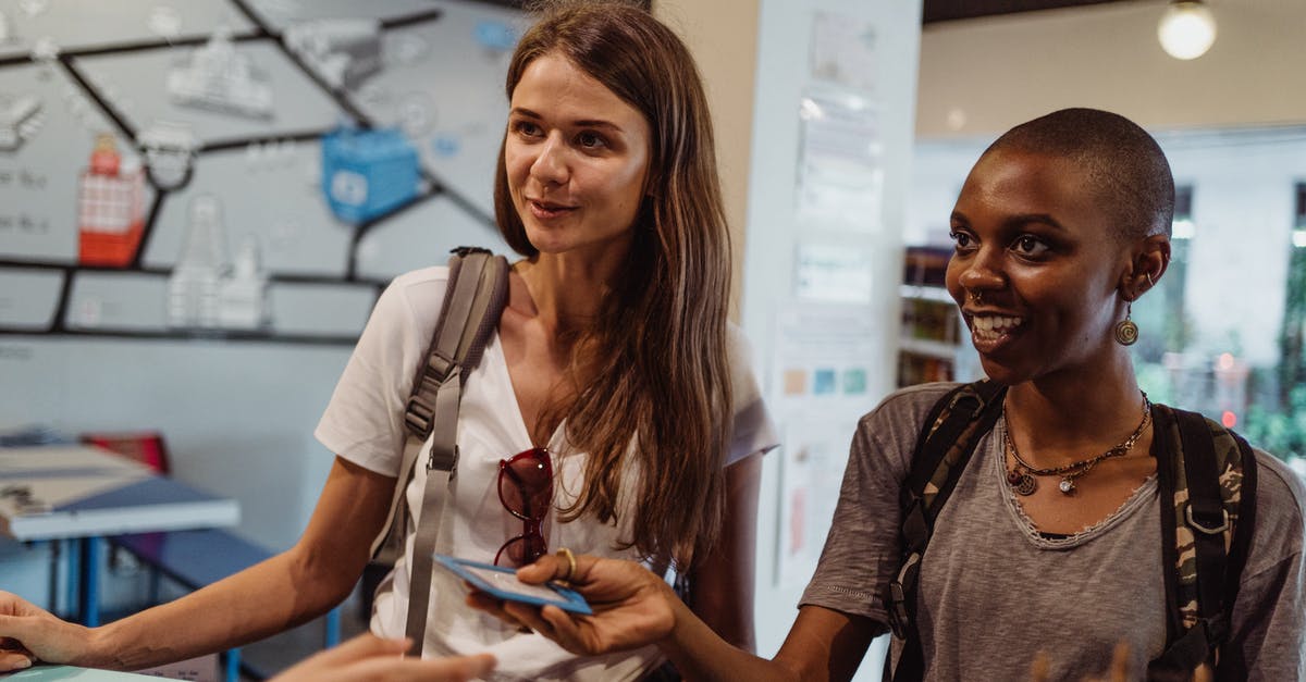 Residency checks for Interrail passes? - Two Young Women with Backpacks Checking In