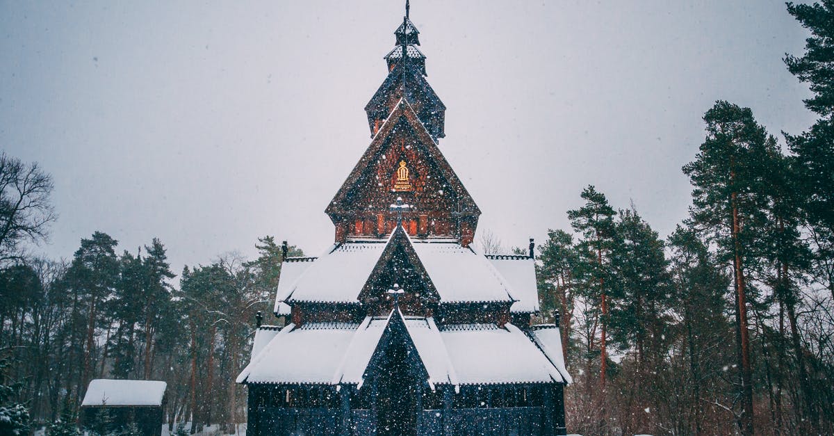 Restaurants during Christmas in Norway - Snow-covered House Beside Trees