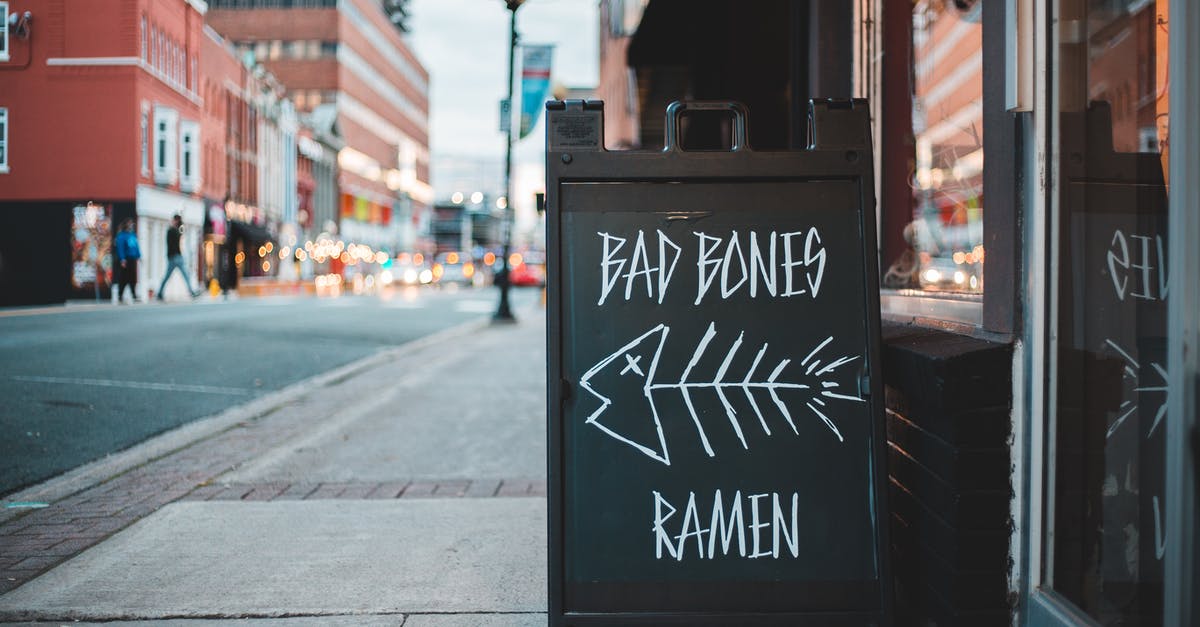 Restaurants in Leipzig, Germany that offer local food - Blackboard stand placed on street near cafe