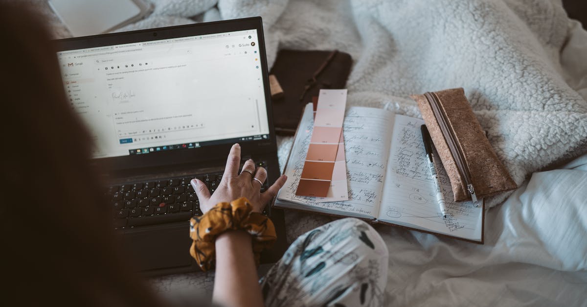 Retaining access to email when traveling - Photo Of Person Using Laptop