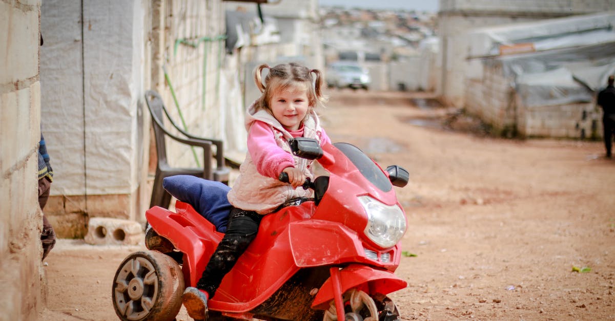 Riding motorcycles in Medellin, Colombia with a US DL - Free stock photo of bike, boy, child