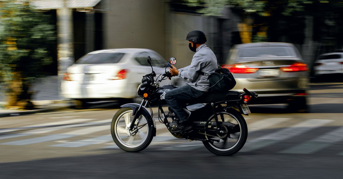 Riding motorcycles in Medellin, Colombia with a US DL - A Man on a Motorcycle 