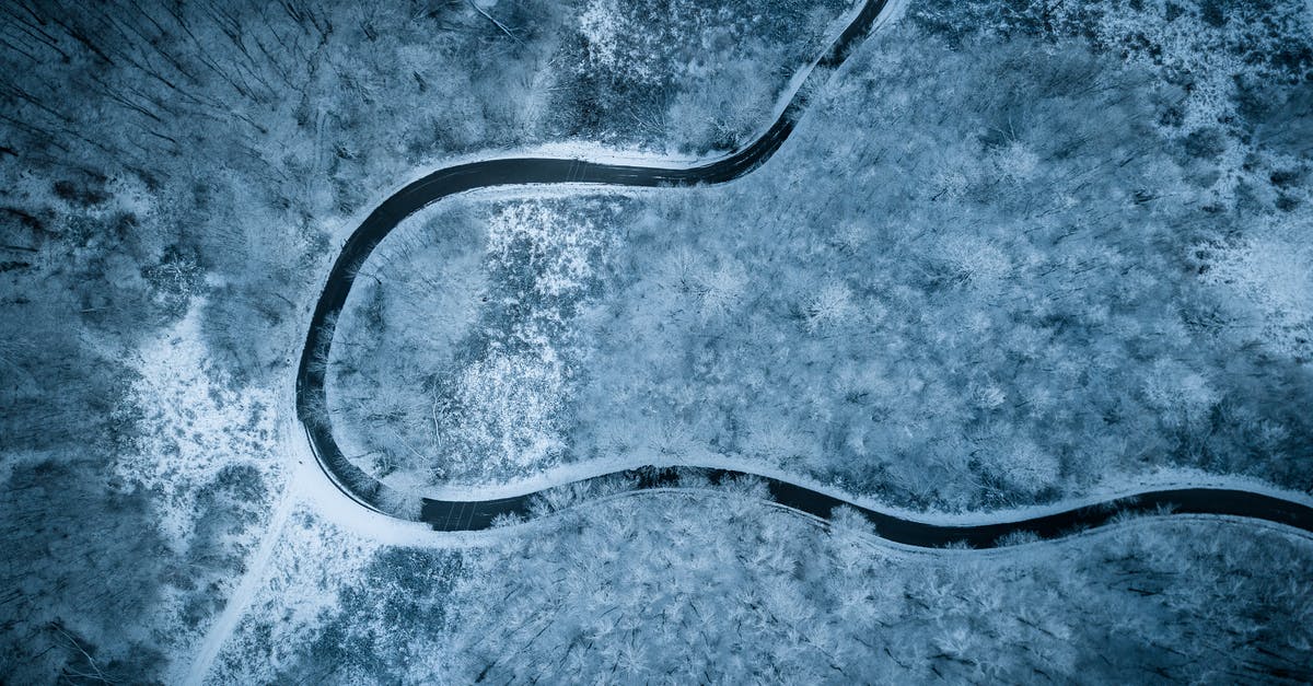 Road conditions on Eastern USA/Canada roads in Winter - Aerial View of River