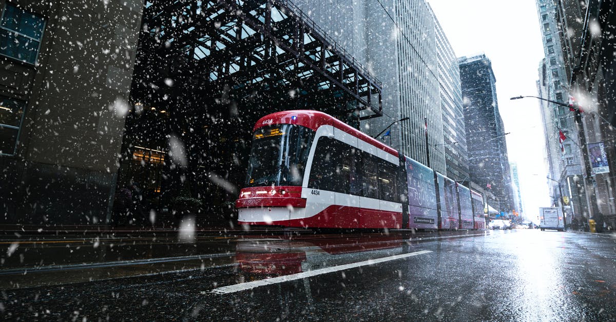 Road conditions on Eastern USA/Canada roads in Winter - Streetcar Passing Buildings 