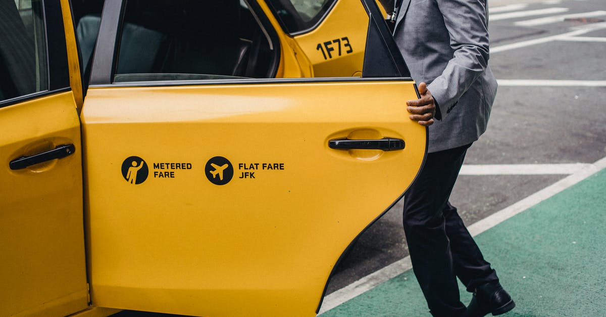 Roland-Garros (French Open) public viewing in Paris? - Crop faceless black man opening taxi door