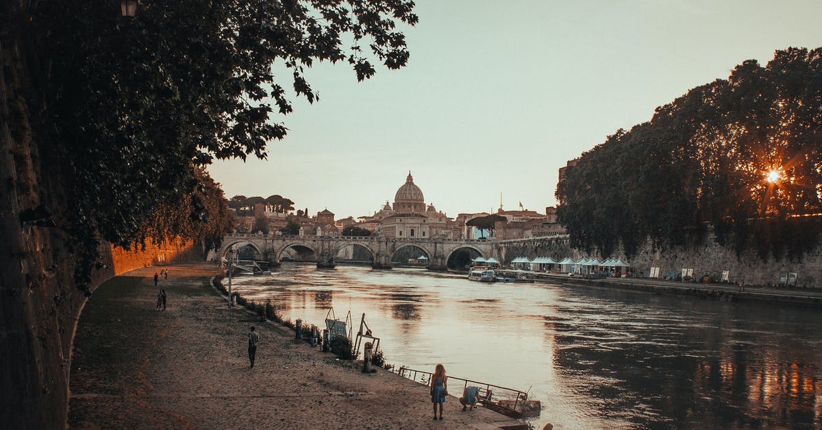 Rome - circumventing ticket lines. Is it even possible? - Black Concrete Pathway Beside Body of Water