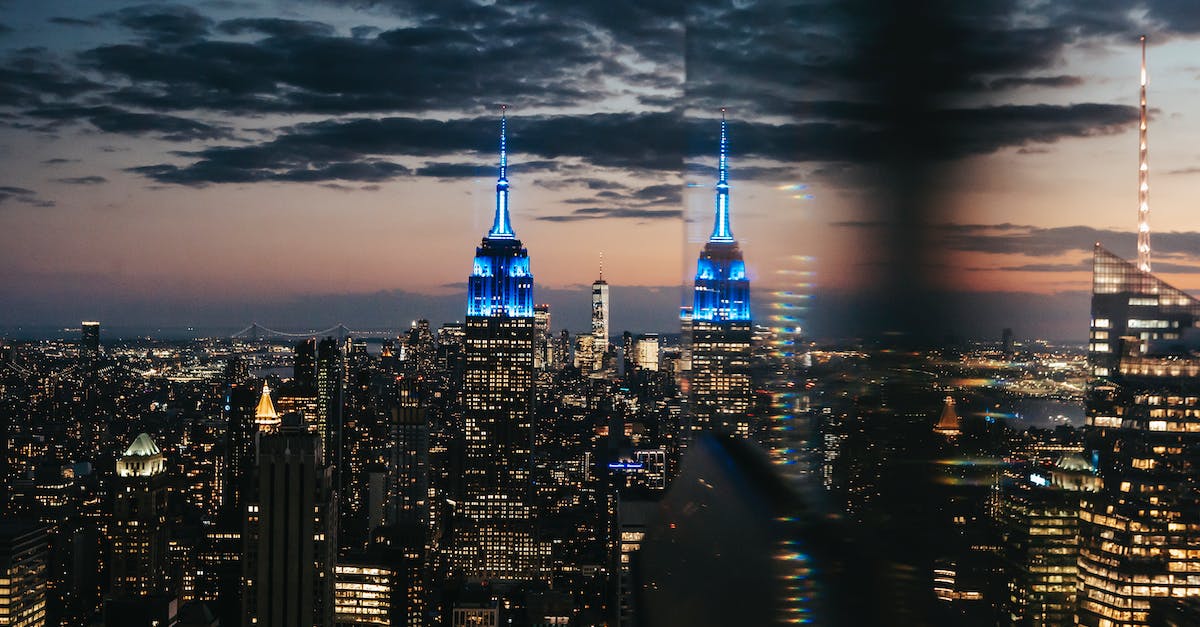 Rooftop bar in Manhattan? - Cityscape of modern megapolis in night time