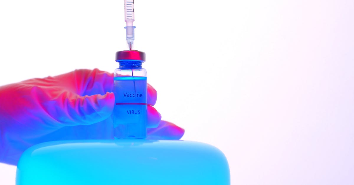 RT-PCR v PCR Test for entry into Belarus - A Person Holding a Syringe and a Vial