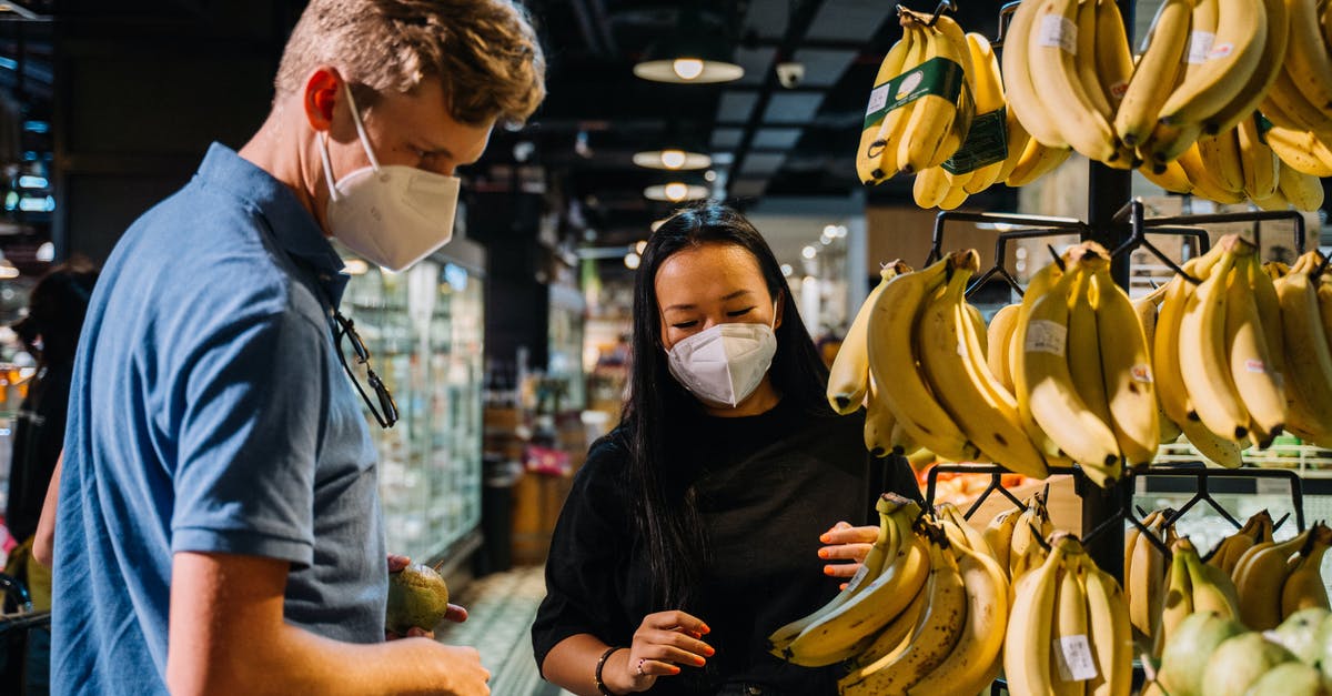 Safety considerations for solo female business traveller in Mexico - Couple Looking At Fresh Food Inside A Market