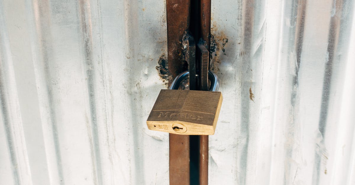 Safety in Bangkok [closed] - Brown Wooden Padlock on White Wooden Door