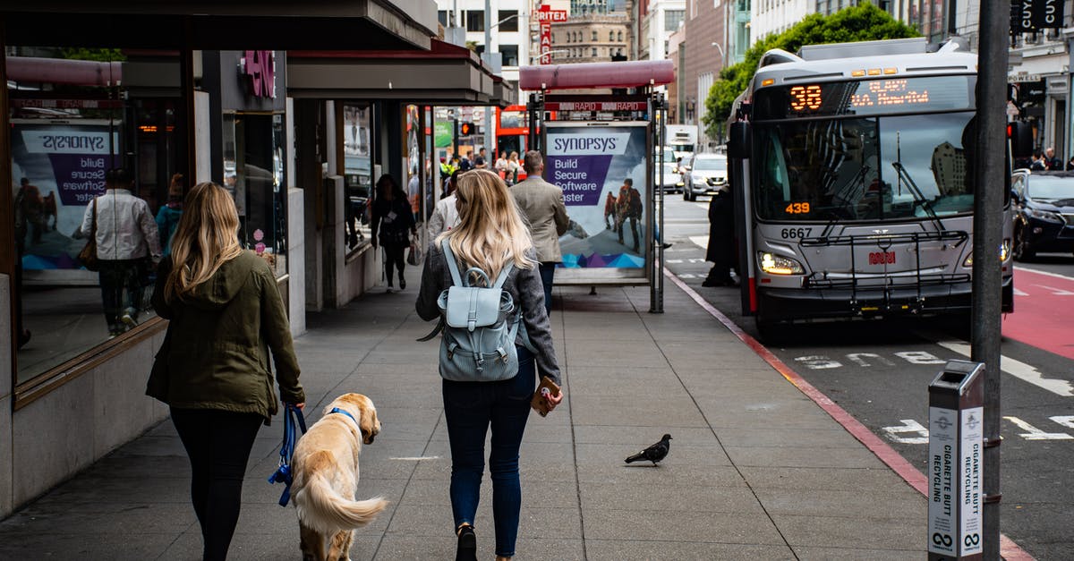 San Francisco to Los Angeles: bus or plane? - Women Walking On Side Street