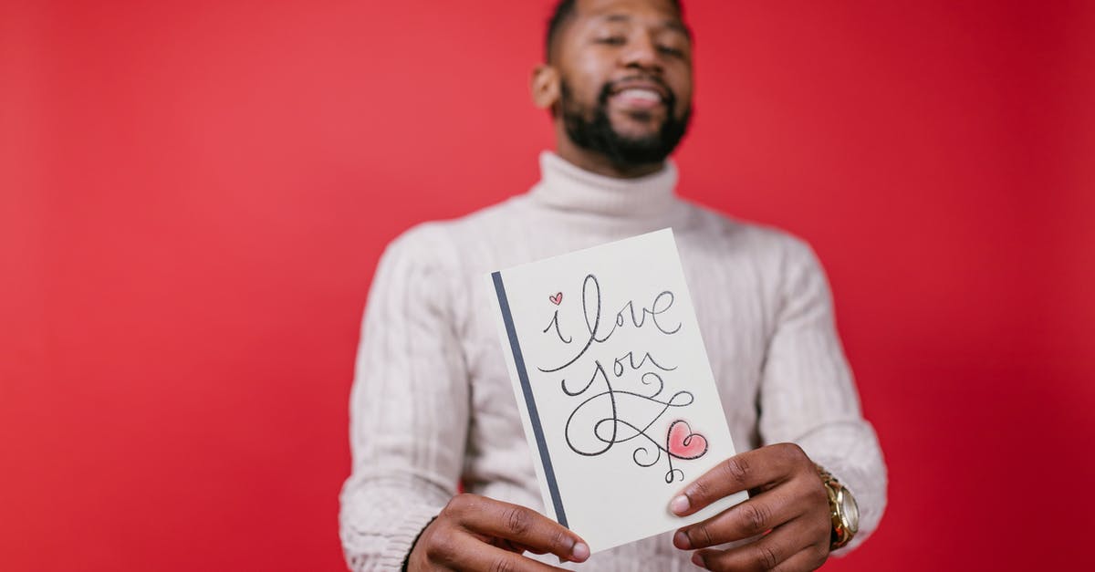 Schengen 90 days: what's counted? - Man in White Long Sleeve Shirt Holding Valentine's Day Card