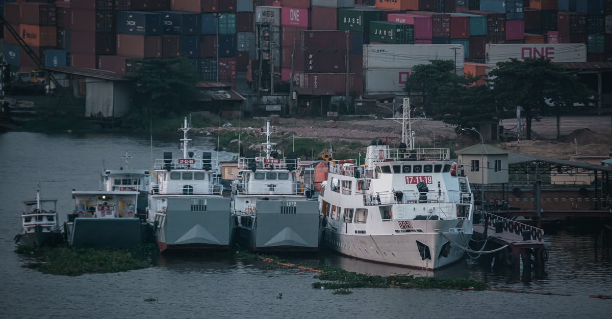 Schengen - Change Port of Entry [duplicate] - White and Red Cargo Ship on Dock