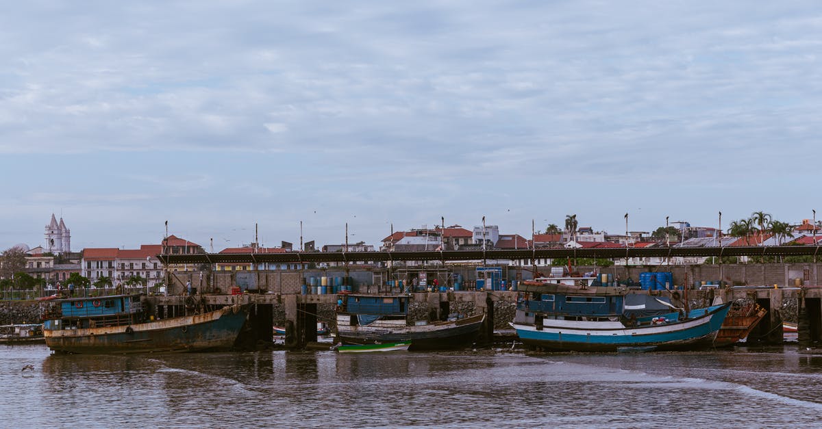 Schengen - Change Port of Entry [duplicate] - Fishing Boats at the Pier under the Sky
