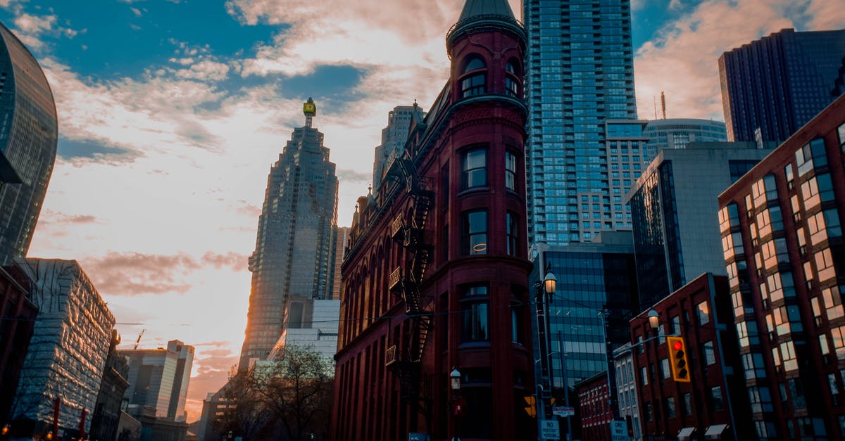 Schengen and Canada - Order of obtaining Visas - Flatiron Building in Toronto, Canada