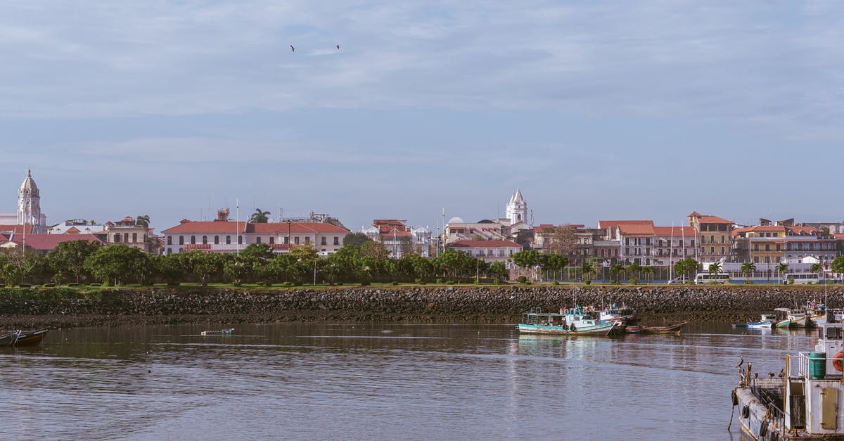 Schengen Visa | Port of Entry - Fishing Boats at the Pier under the Sky
