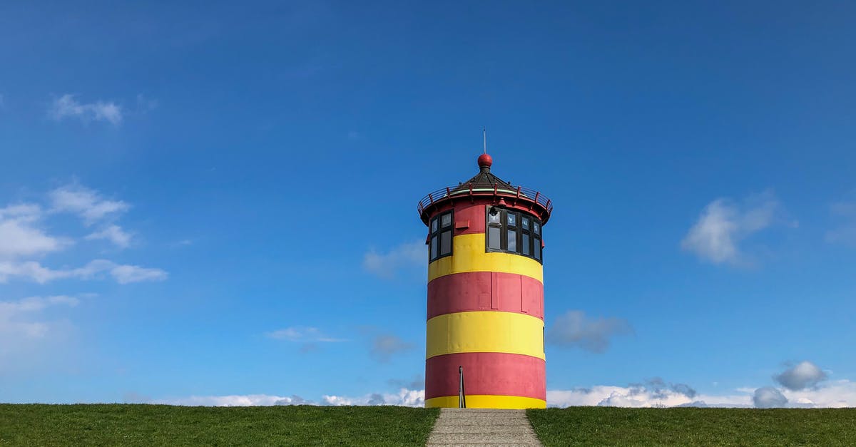 Schengen Visa for Germany refused due to lack of subsistence - Red and White Lighthouse Under Blue Sky