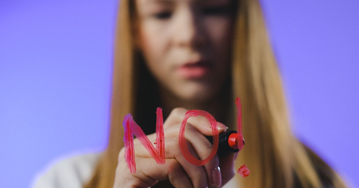 Schengen visa refusal - Studio shot of girl writing No word on glass