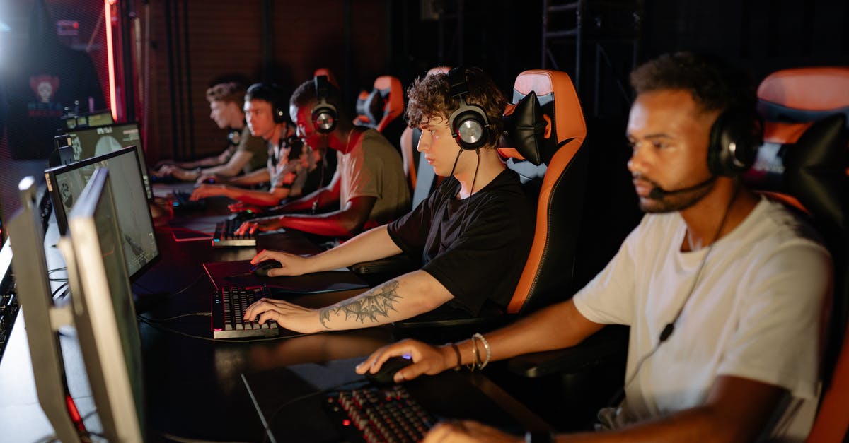 Schengen Visa Sponsorship for group - A Group of Gamers looking Serious in a Tournament