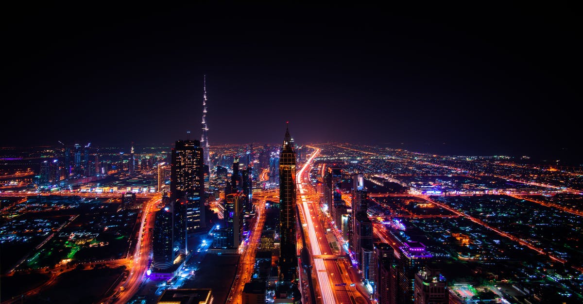 Seafarer transiting through Dubai - High Rise Buildings during Night Time Photo