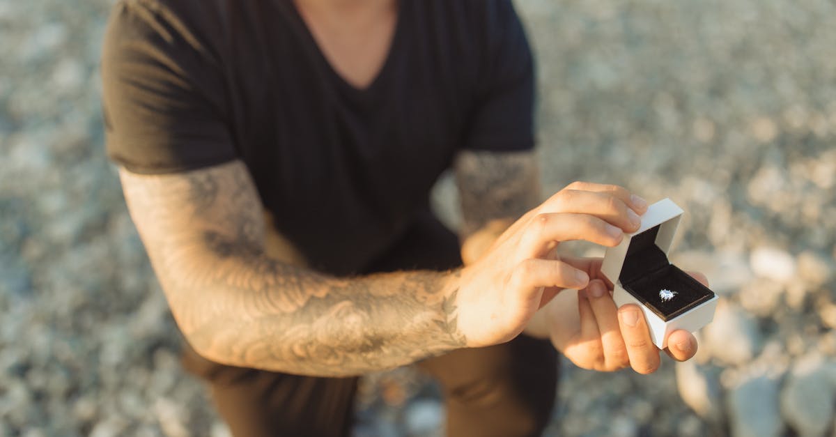 Second Schengen visa application refused within two days - Man in Black Crew Neck T-shirt Holding Black Smartphone