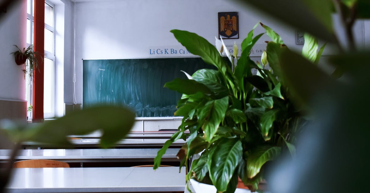 Secondary school leaving certificate nostrification in Czech Republic [closed] - Empty light classroom with blackboard and desks