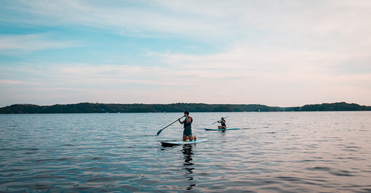 Seeking lake to paddle board at Mt Baker, Glacier, WA - People with rows on paddleboards