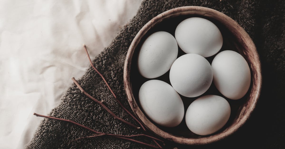 Self-isolate if my home country rises above threshold while I'm in Latvia? - Top view of chicken eggs in wicker bowl placed near twigs on gray towel Self-isolate if my home country rises above threshold while I'm in Latvia? - Top view of chicken eggs in wicker bowl placed near twigs on gray towel