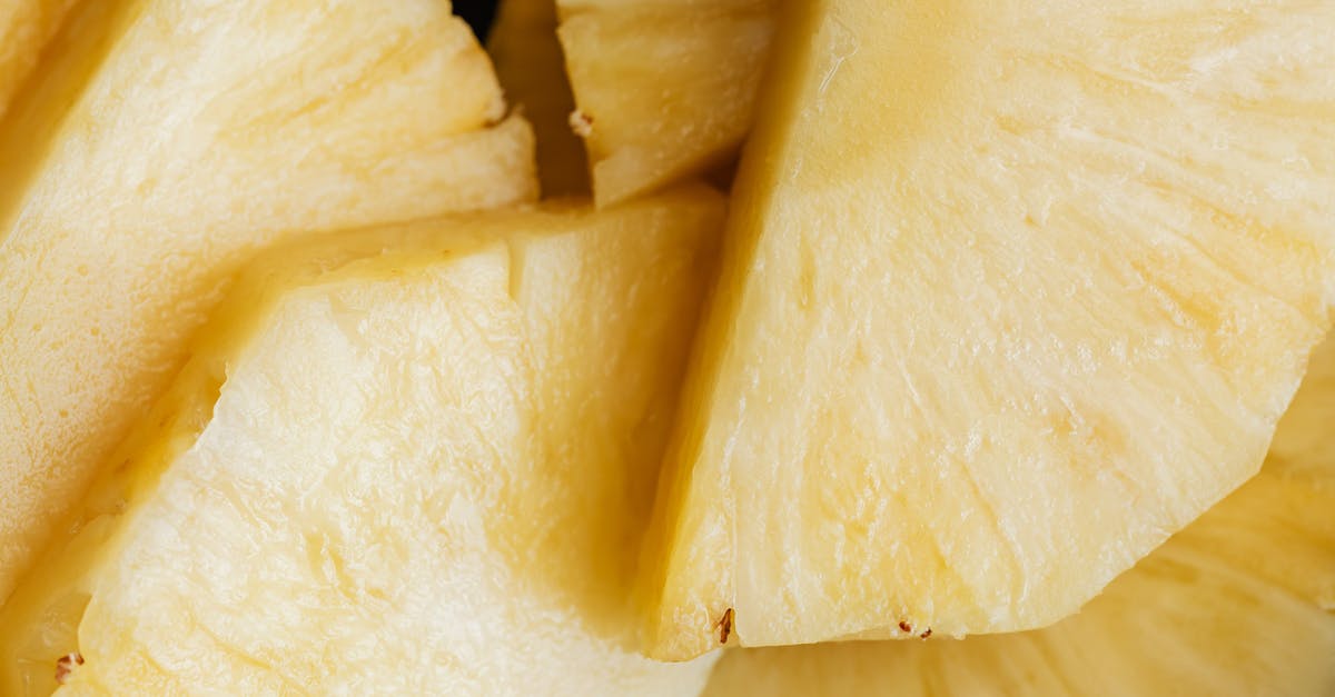 Sending cut orchids from Singapore to Australia [closed] - Top view closeup background of yellow ripe fresh sliced pineapple placed on top of each other