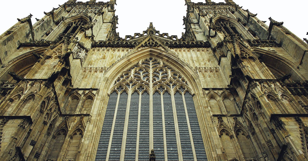 Sending UK visa application to New York - Low Angle Photography of a Brown Cathedral Building