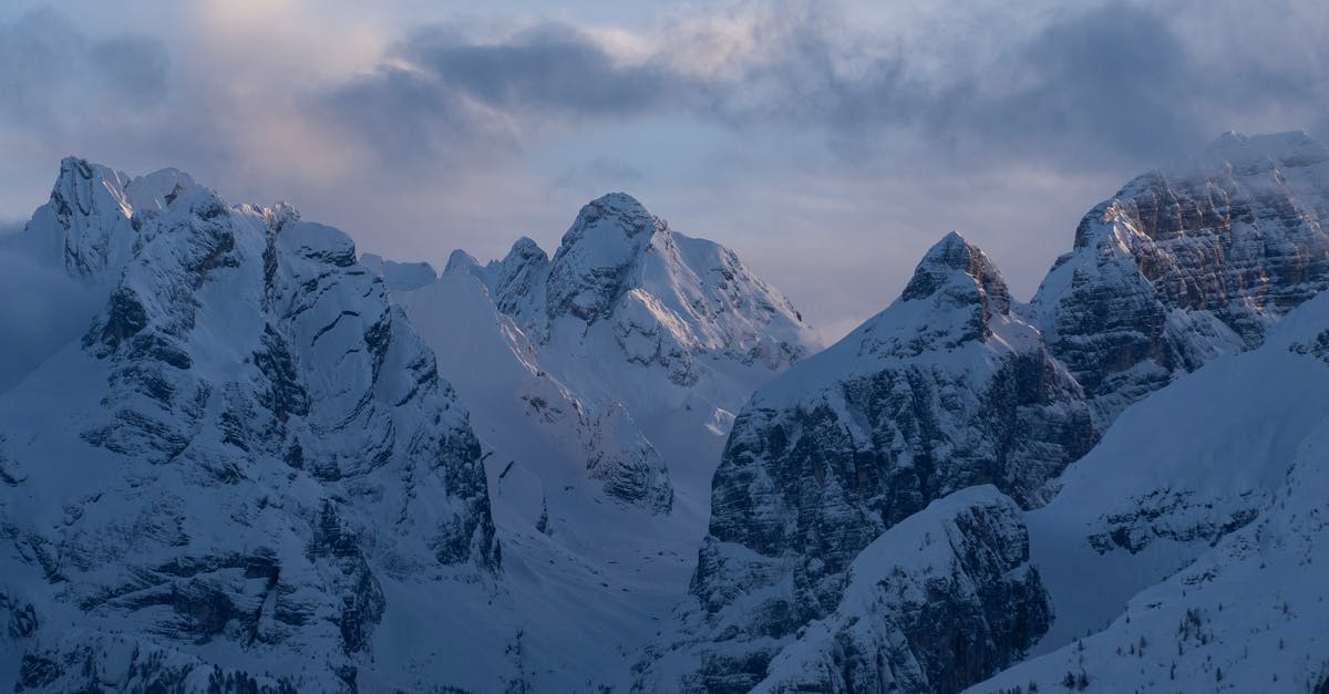 September/October in the Alps - Snow Covered Mountain Under Cloudy Sky