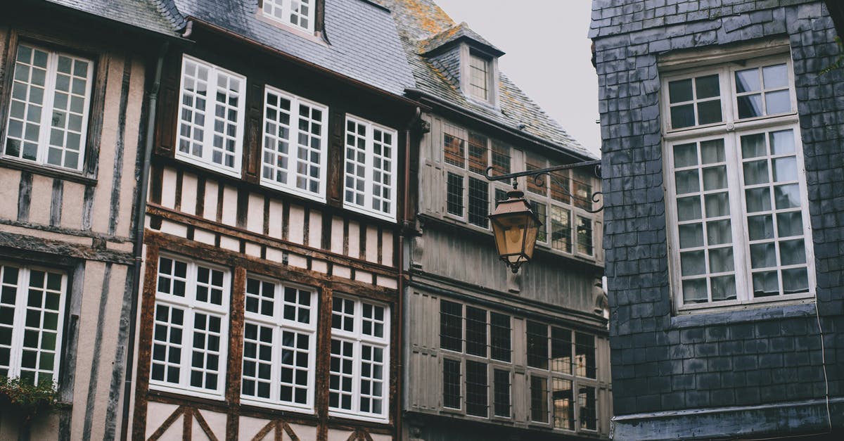 Short-term renting in Germany - Historic city street with typical houses in Bavarian style with decorative timber frames in daylight