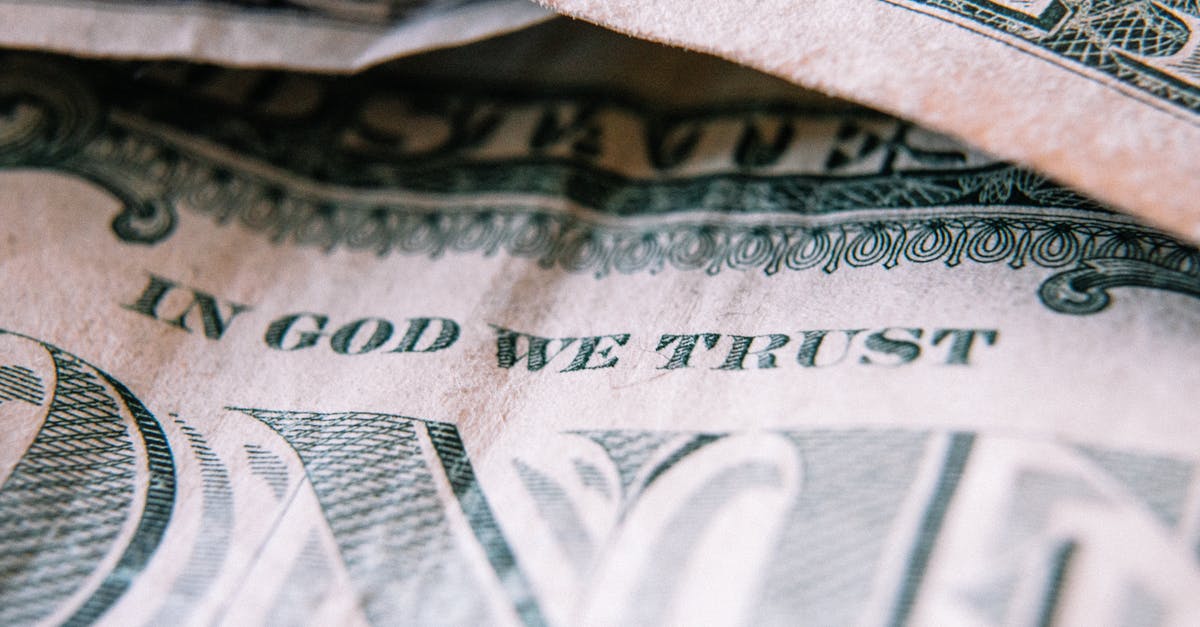 Should I deposit money back into my account when waiting for a visa - One dollar banknotes placed on table Should I deposit money back into my account when waiting for a visa - One dollar banknotes placed on table