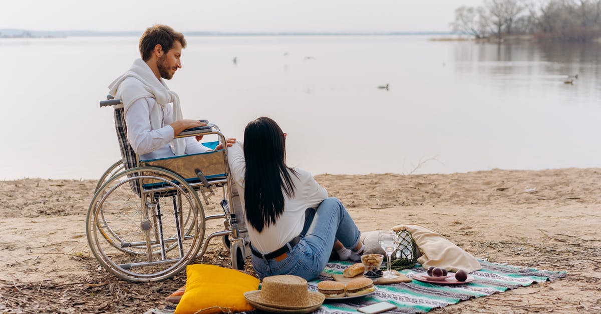 Should I use a possibly invalid Schengen visa for France? - Man and Woman Near the Lake