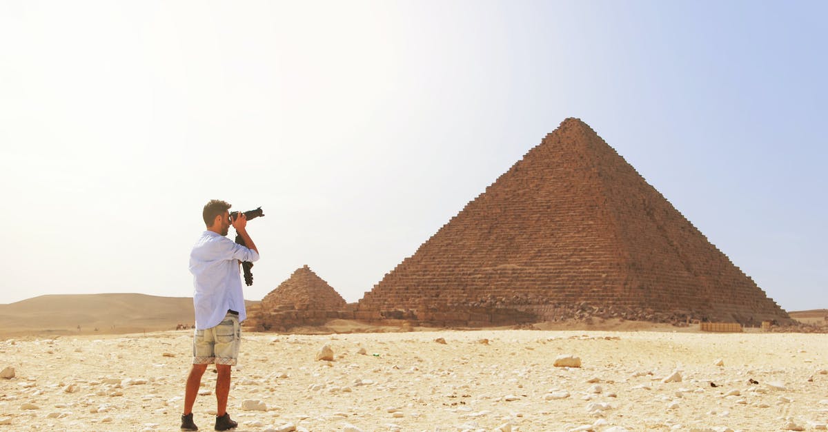 Should I wear cotton or synthetics in Egypt near summer? - Man Taking Photo of the Great Pyramid