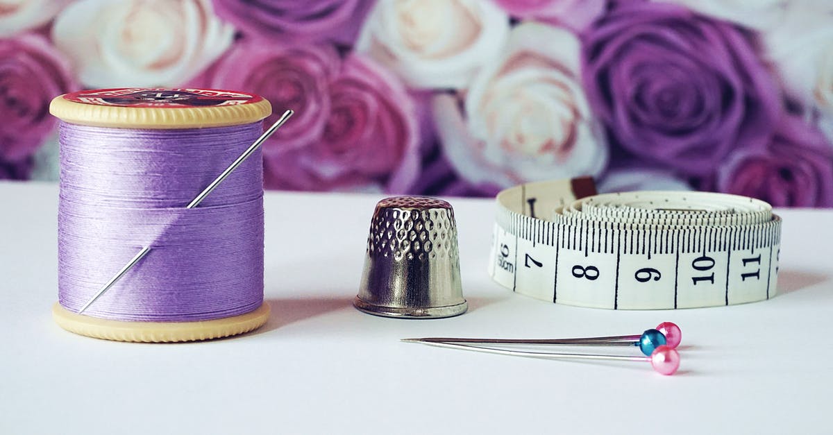 Should I wear cotton or synthetics in Egypt near summer? - Spool of Purple Thread Near Needle Thimble and Measuring Tape