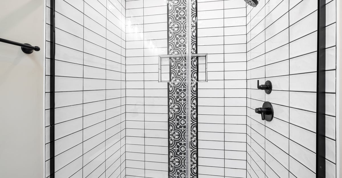 Shower at Heathrow during layover in Terminal 5 - Black and White Track Lights
