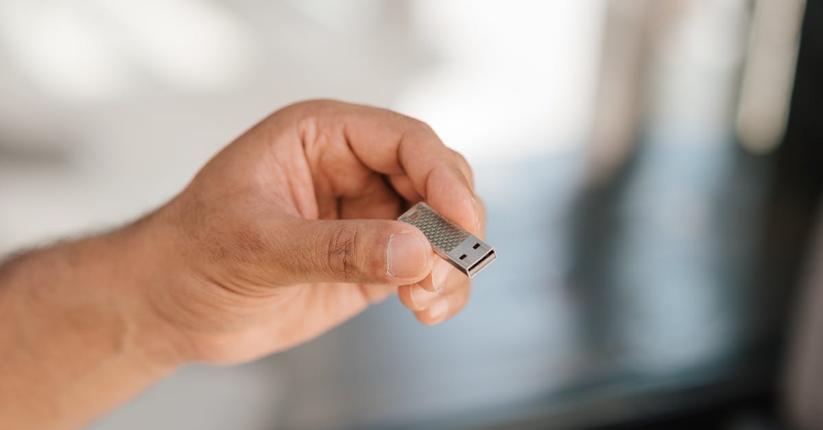 Showing evidence for informal savings - Man with small modern device for storage and transfer information