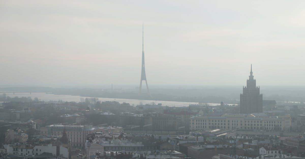 Sightseeing and food in Riga [closed] - Gloomy Riga cityscape on foggy day