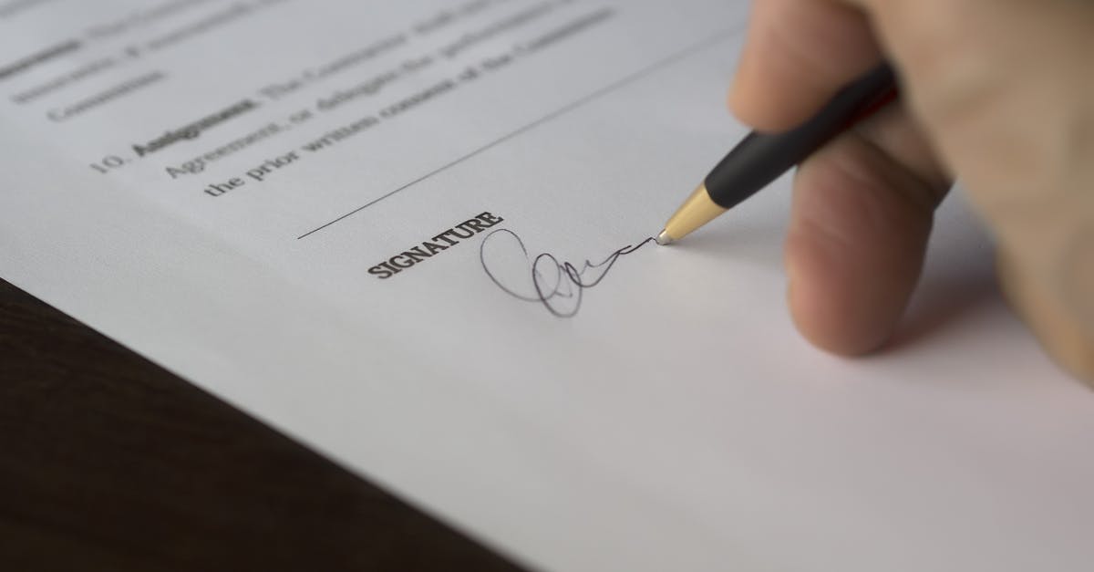 Signature option not available on UK visa form - Selective Focus Photography of Person Signing on Paper