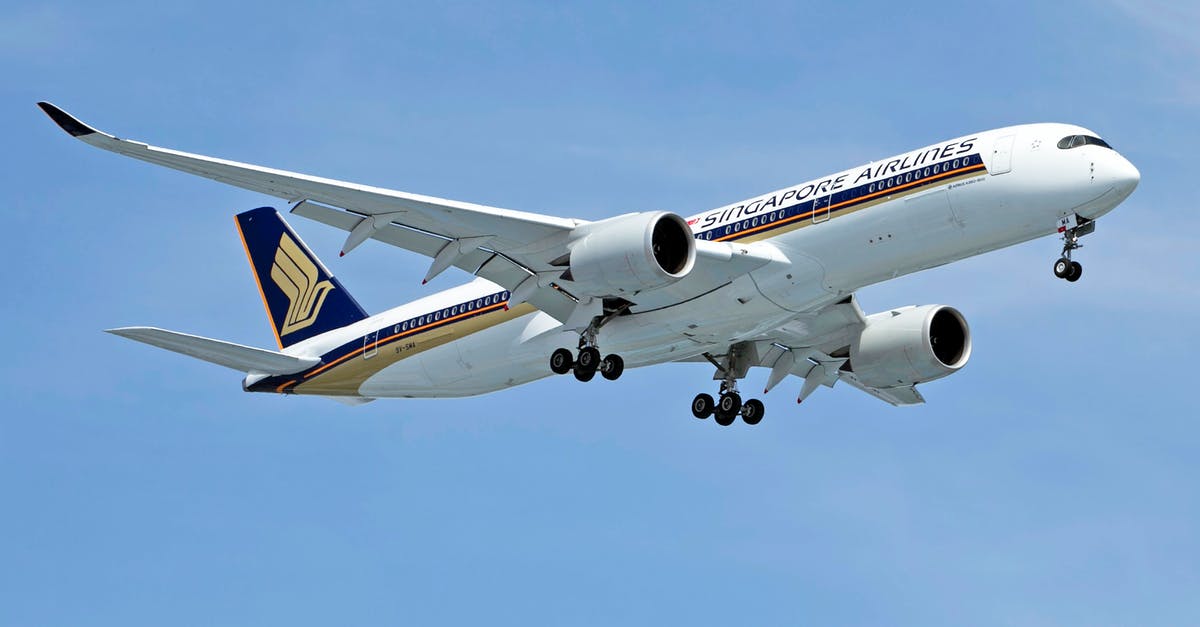 Singapore airlines changed my flight by +5h, can I get a refund? - A Plane with Landing Gears