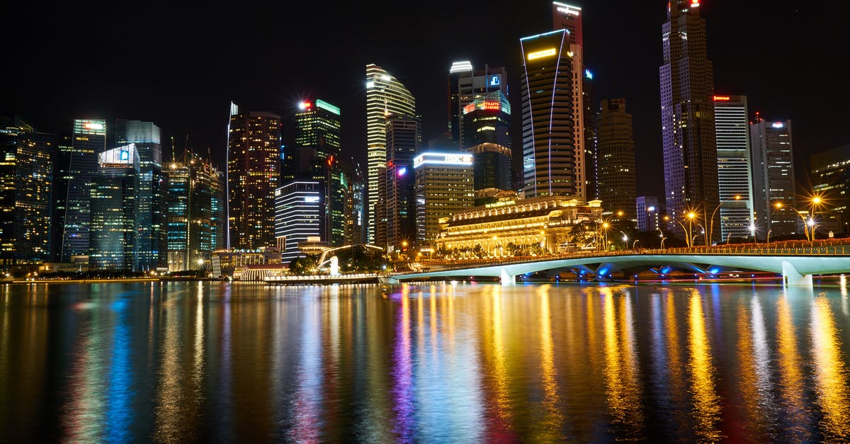 Singapore airport to hotel late at night - Lit Building Lights