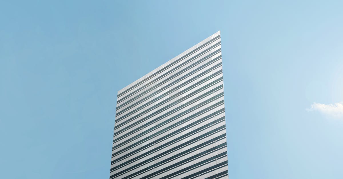 Singapore during Covid: Do I just need an approval letter? - White Concrete Building Under Blue Sky