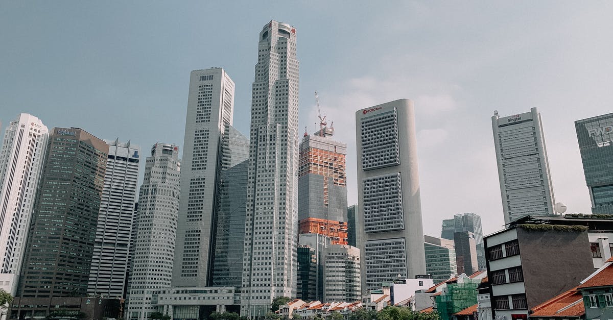 Singapore Passport Holder & UK Permanent Resident - Modern buildings in downtown of megapolis