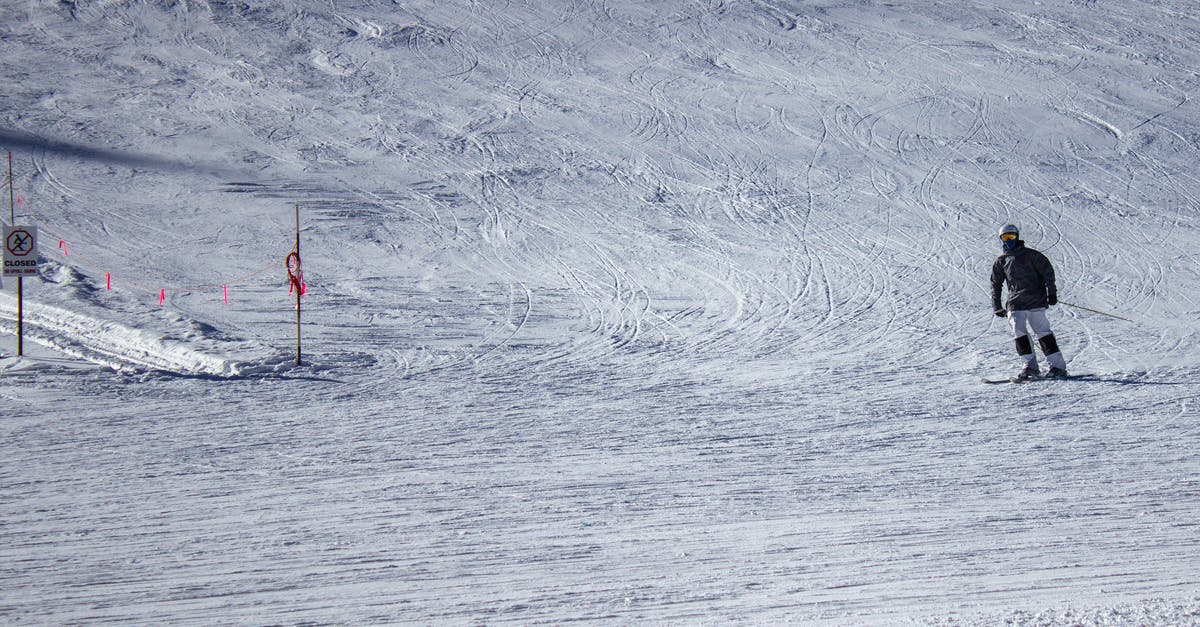 Skiing near Frankfurt 18-23 February - Person in Red Jacket and Black Pants Standing on White Snow Covered Ground