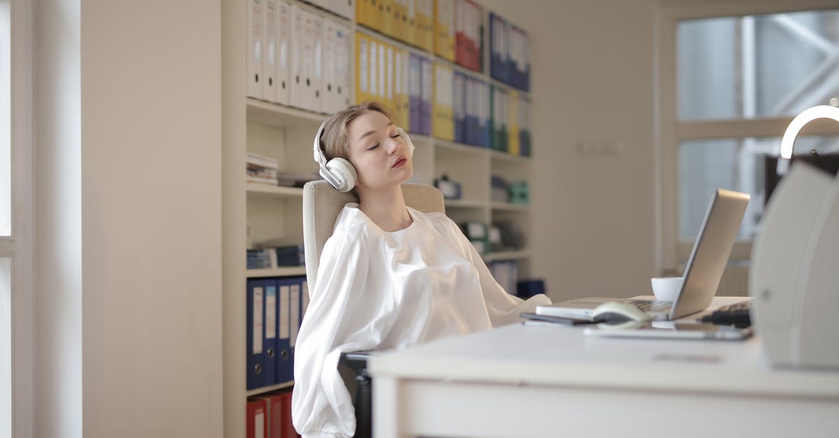 Sleep sitting upright [duplicate] - Woman in White Dress Shirt Sitting on Chair