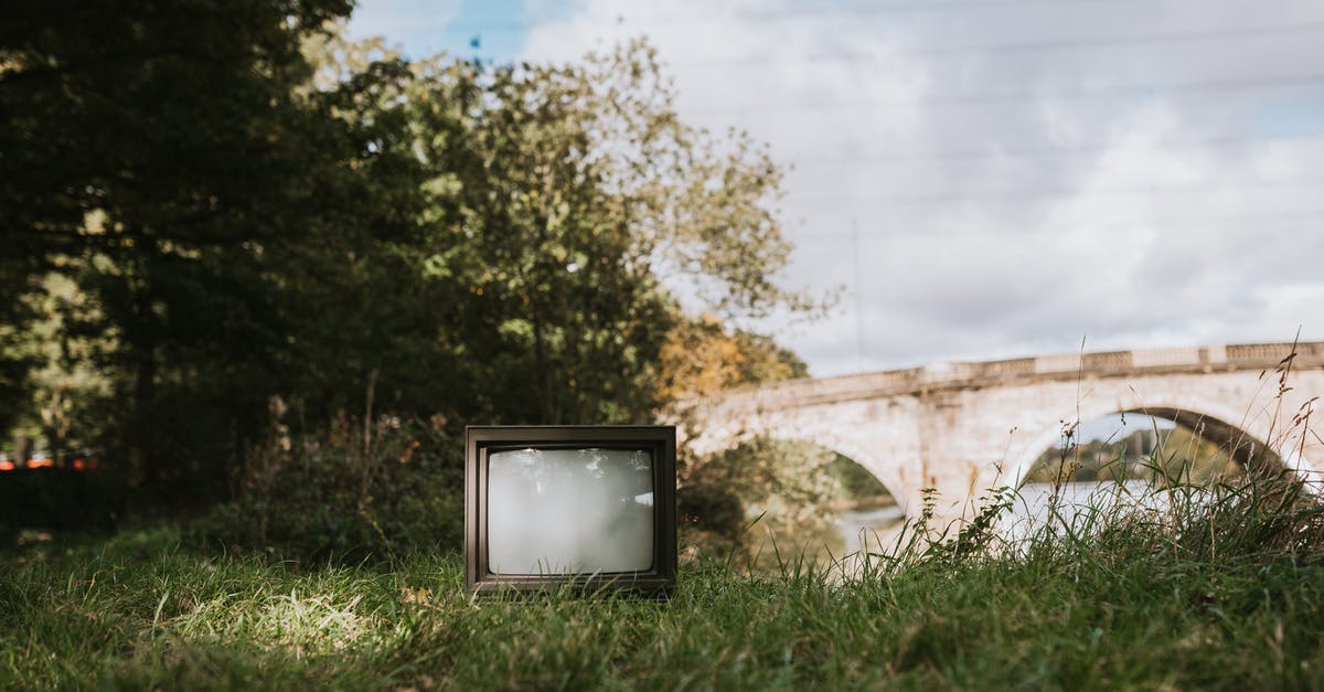 Small historical stone bridge in the North of Seoul - Old TV set on grassy coast