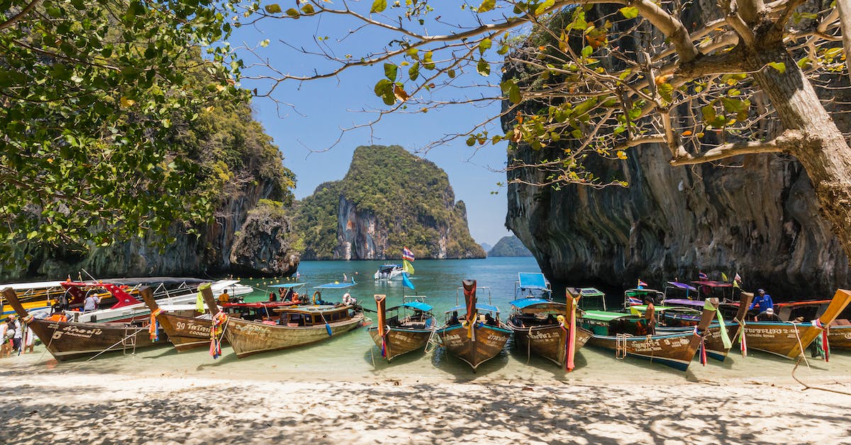 Snorkeling and beach location for Southern Thailand (Phuket/Krabi) in July? - Boats on Seashore