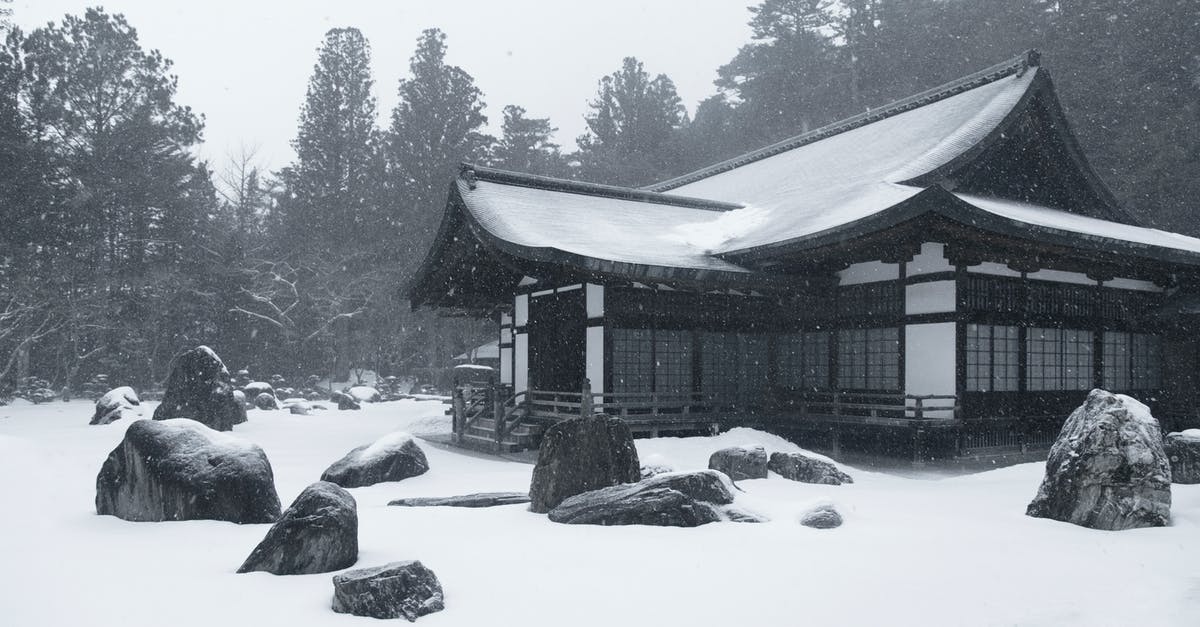 South Korea vs. Japan. Which gets cold earlier in autumn? - White aAnd Brown House Covered With Snow