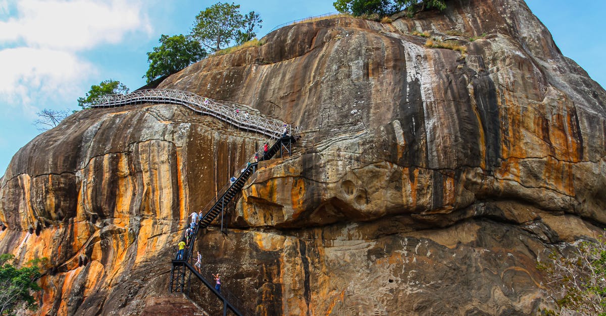 Sri Lanka as a tourist: Are there regions I should avoid? - People Climbing Stairs Mounted on the Rock Mountain